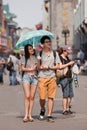 Young lovers with a parasol, Beijing, China